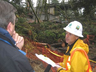 WSDOT geotechnical engineer Tom Badger explained to the media on Nov. 18 how the soil was moving beneath the State Route 169 Kummer Bridge support.