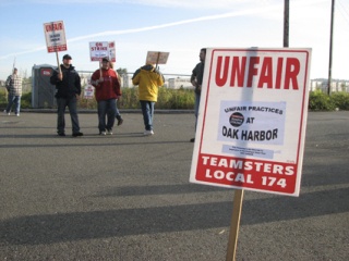 Teamsters joined the picket lines early Tuesday morning along West Valley Highway. More than 600 regional truck drivers from Oak Harbor Freight Lines officially went on strike Monday night.