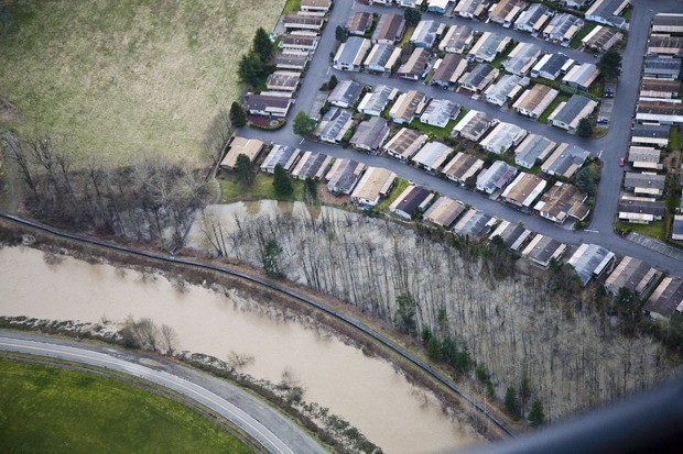 A look from above shows the Green River and the Reddington levee in proximity to the River Mobile Estates in northeast Auburn. The levee is worn