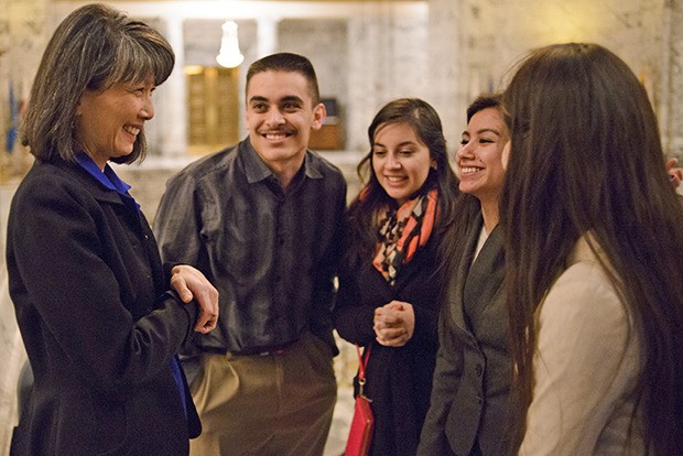 Students celebrate with legislators after the passing of the Real Hope Act. Rep. Sharon Tomiko Santos