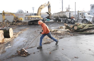 Crews clear away the debris