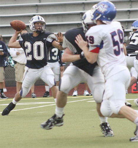 Auburn Riverside quarterback John Hakala in action against Kent-Meridian this past Friday.