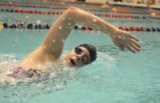 Jefferson freshman Amber Cratsenberg practices in the pool at the King County Aquatic Center in Federal Way. Cratsenberg will compete in four events at the state 4A swim and dive championship meet Friday and today.