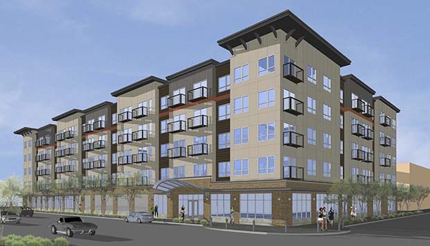 Future glance: A developers’ conceptual look of the Auburn’s Project Lofts at the corner of West Main and South Division streets. The mixed-use building is to be composed of 12