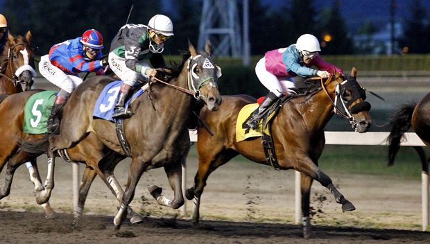 Tros (No. 3) and Nosetodagrindstone (No. 4) rally to a dead-heat in Friday's feature race for 3-year-olds and up at Emerald Downs.