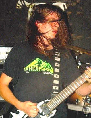 Guitarist Jess Hudson jams for the band UnHailoed.
