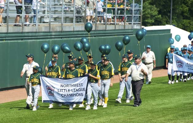 The Auburn Little League All-Stars join others team in the opening ceremonies today. Auburn faces Fairfield