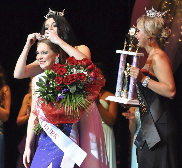 Outgoing Miss Auburn Daniela Ferrell places the tiara on the new Miss Auburn