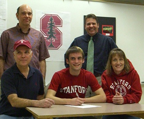 Kenny Krotzer signs his letter of intnt to run track and cross country for Staford next year. Front row