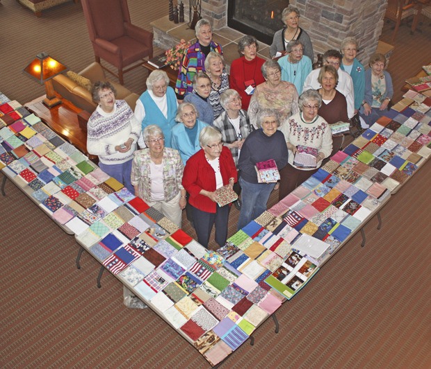 About 30 seamstresses donated more than 425 hours of labor to complete the one-month project. They bettered last year's output of 127 pillowcases.