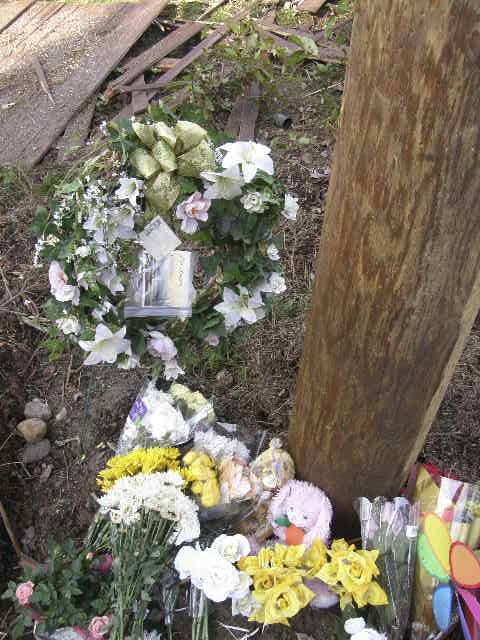 A memorial appears at Southeast 320th Street