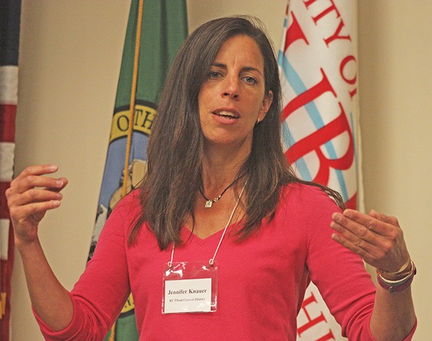 Jennifer Knauer explains the King County Flood Control District’s plans to identify and improve the levee system along the Lower Green River at a public meeting Tuesday in Auburn.