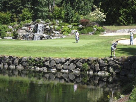 Golfers enjoy the challenge of taming the Auburn Golf Course’s short but  intimidating par-3 16th hole during play this week.