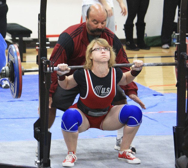 Jill Joiner-Wong competes in the squat at the Fife  Holiday Classic in December. She cleared 286.5 pounds in the event