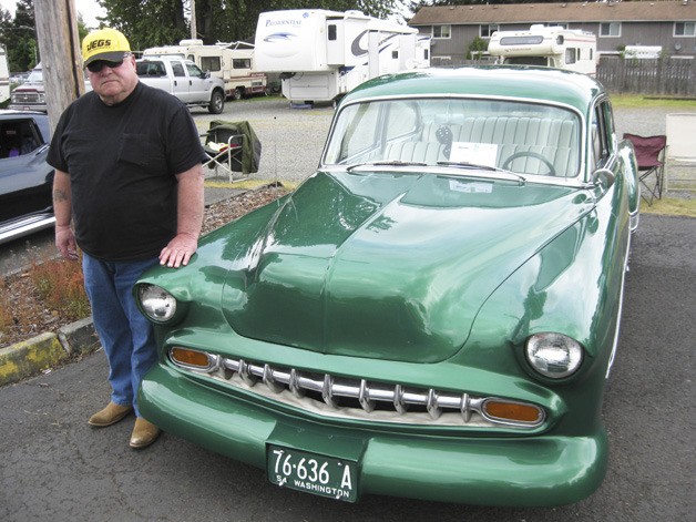Gary Jordan stands by his 1954 Chevrolet at the recent Terry Home 19th annual Show and Shine at the Auburn Eagles