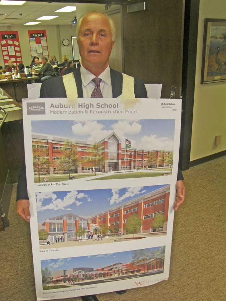 Superintendent Kip Herren sports a sandwich board to help others understand the significance of the $110 million Auburn High School modernization and reconstruction bond measure on the Nov. 6 general election ballot.