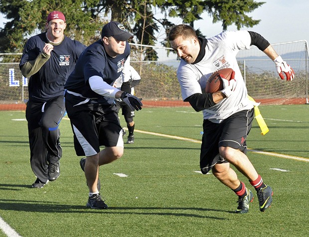 It was cops against firefighters in the benefit Turkey Bowl flag football game last Saturday at Auburn Mountainview High School. The game between Auburn Police and the Valley Professional Firefighters collected food donations for the Auburn Food Bank. Above