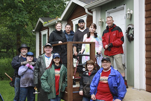 Volunteer workers came together to build a new ramp for Carol Burdett
