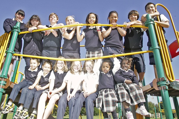 Holy Family School has a collection of similar-looking siblings this fall. Six sets of twins and one set of triplets attend the Catholic school. Pictured from left