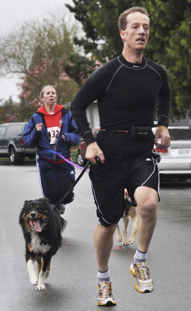 Mark Casey captured the 5K Dog Trot for his age division with his pal