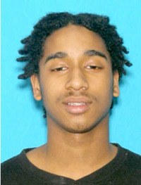 Authorities are looking for James Mills in connection with Sunday's shooting death of a teenager.