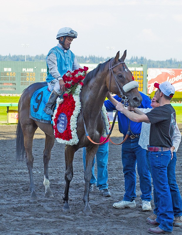 Stryker Phd and jockey Leslie Mawing moments after victory in the 79th running of the $200