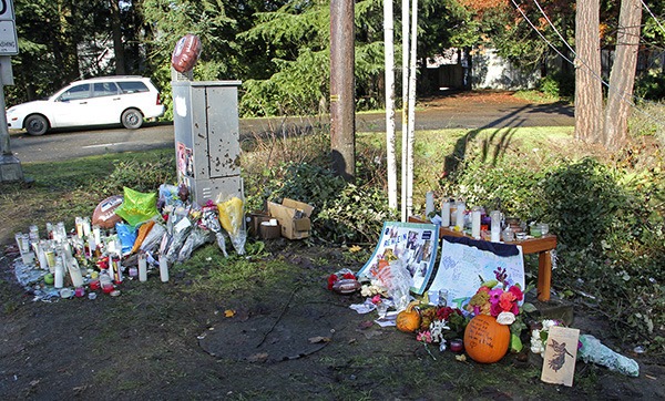 Memorials to the four passengers killed in this past Saturday's accident on Auburn Way South have sprouted at the crash site. The accident killed Caleb Graham