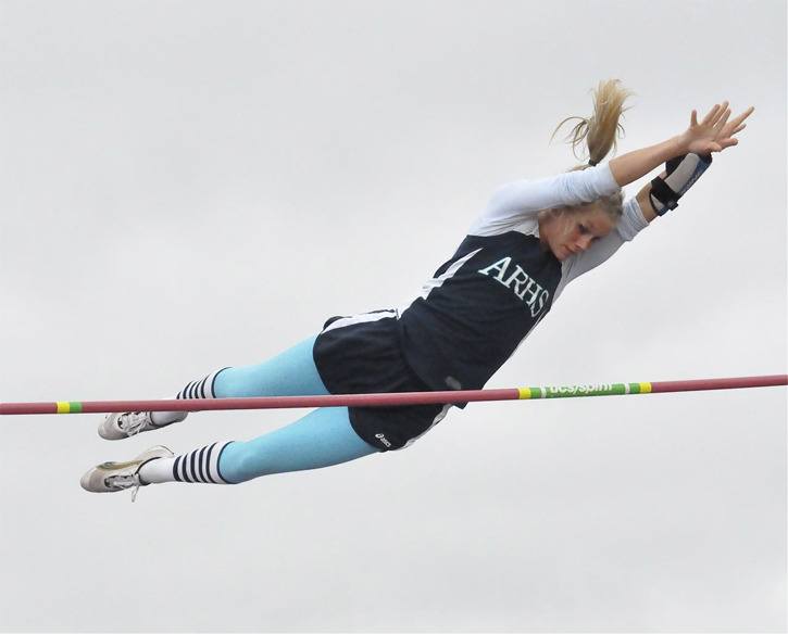 Auburn Riverside senior Rebecca Turnbow clears the bar in the Washington State Girls 4A pole vault championships at Mt. Tahoma Stadium. Turnbow finished third in the competition with a 12-foot vault.