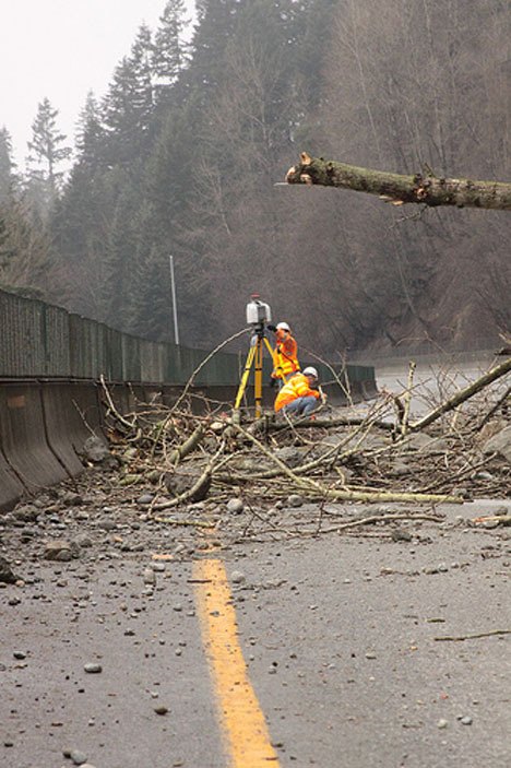 Crews were busy clearing debris from two westbound lanes on Highway 18. WSDOT officially reopened the lanes early Tuesday