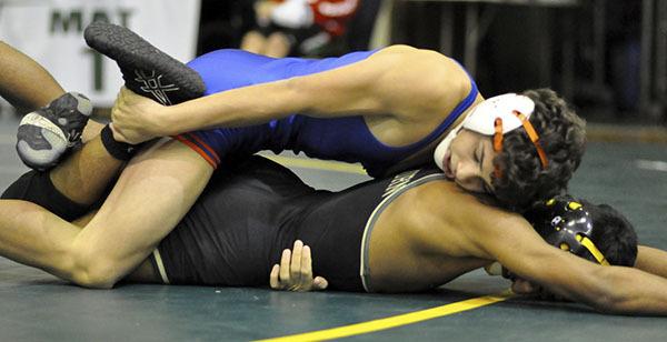 Auburn Mountainview's Brahm Trujillo and Auburn's Balteer Rana in action at the Auburn Invitational Wrestling tourney.