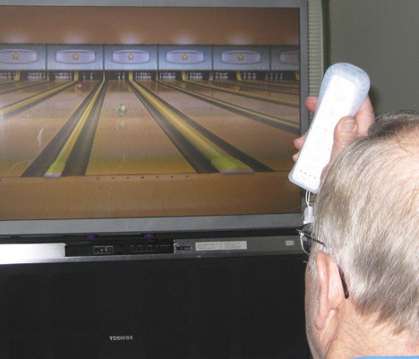 Jim Granquist sends the bowling ball down the lane during a recent tournament between Auburn and Spokane seniors. Team Auburn cleaned up with a resounding match win.