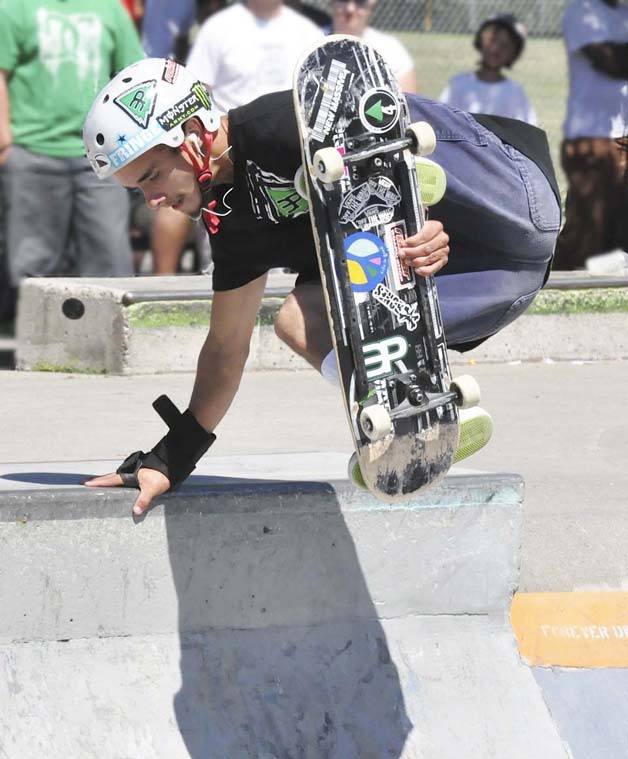 Brandon Smith does a trick during the Battle of the Bowl skateboard competition at Brannan Park.