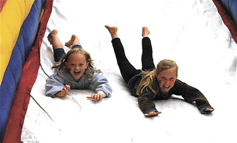 Going down the slide at the recent KidsDay at Game Farm Park are Dylana Segrest