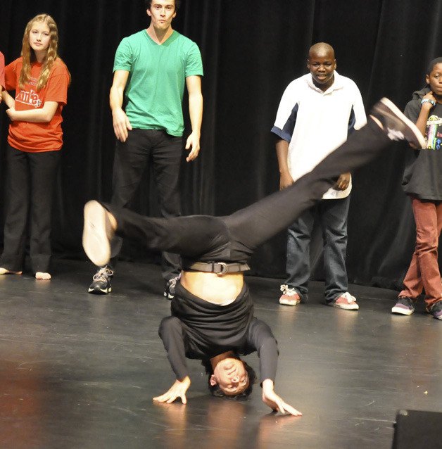 Auburn-area students perform during the recent 12th annual Reaching Out Fair at the Auburn Performing Arts Center.