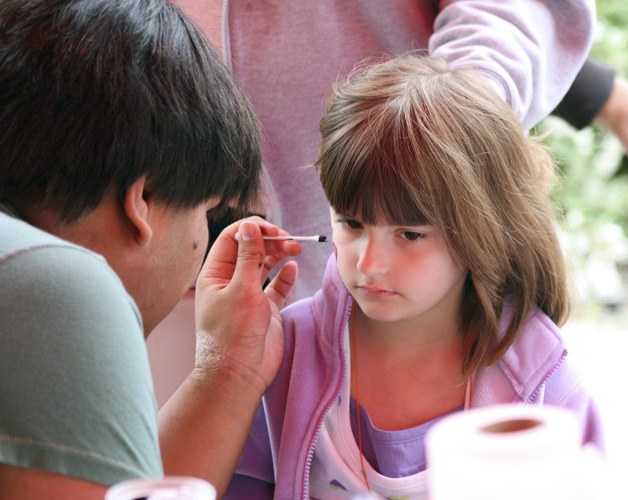 Face painting is part of the Auburn Farmers Market