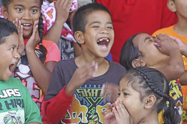 Sing it loud: The Marshallese United Church of Christ Sunday School Choir performs during a celebration at Veterans Memorial Park last Saturday.