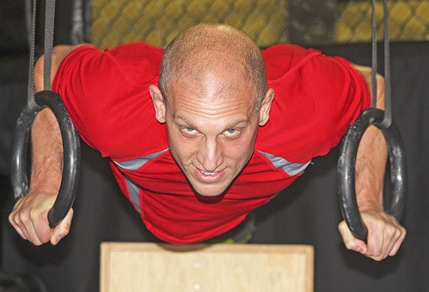 Dan Hahn works both spectrums of the health and fitness industry: as a physician assistant and as a certified CrossFit trainer. He recently opened a gym in south Auburn.