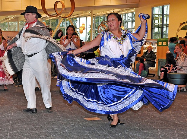 John Hursh and Zita Paluino in Grupo Cultural De Qaxaca dance as the La Banda Gozona musicians play traditional music of Oaxaca