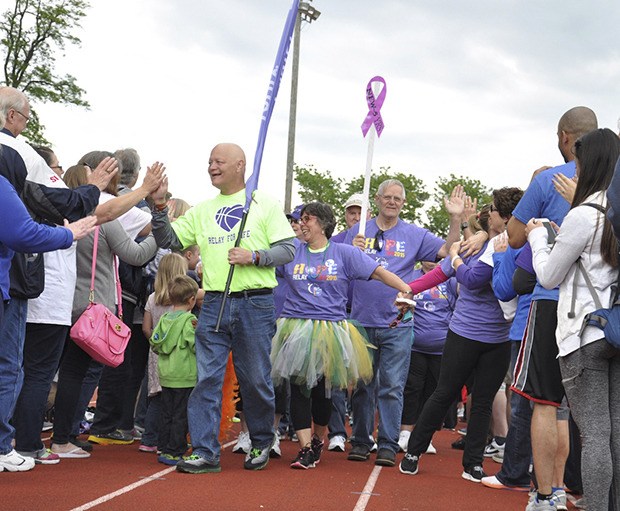 Supporters greet cancer survivors
