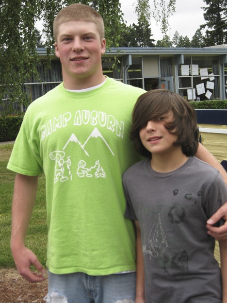 Great save: Camp Auburn counselor Robert English came to the rescue of fifth-grader Nicolas Savoie.