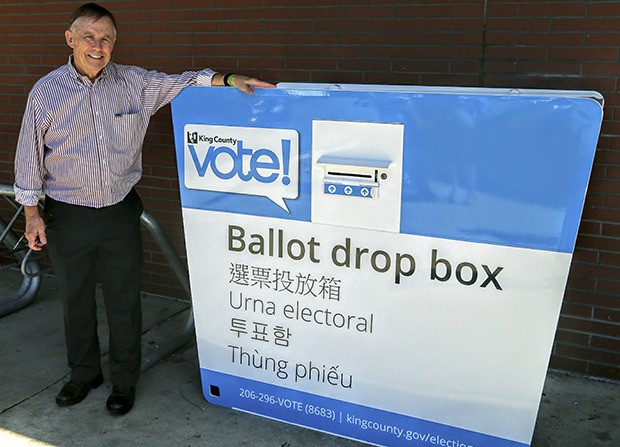 King County Councilmember Pete von Reichbauer unveils the new election drop box in front of the Auburn Library.