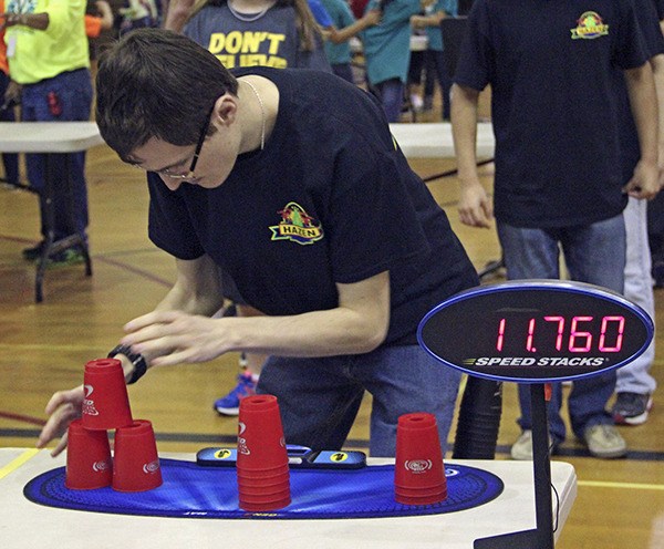 Hazen High School Gold team stacker Pierce Harris competes at the 2014 Northwest Regional Sport Stacking competition