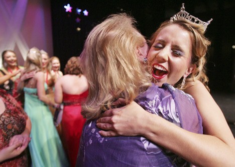 Alicia Wallace hugs her ladies adviser