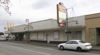 The Stratford Group has proposed redeveloping the block south of City Hall. Its plans call for razing the buildings and replacing them with a high-density residential