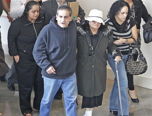 The Marrero family walks out of the court room at the Maleng Regional Justice Center on Friday distraught after Gary Ridgway pleaded guilty to killing their family member