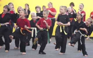 Thirty-three students and instructors participated in the Hopeful Tomorrow Kick-a-Thon at the American Karate Escrima Association School of Self Defense on World Marshall Arts Day. Each participant kicked over 2