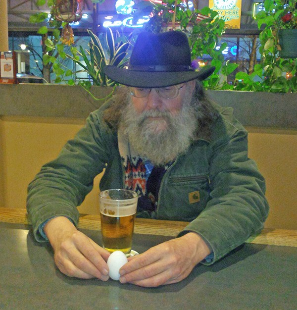 Brian Love enjoys a beverage at his favorite downtown haunt