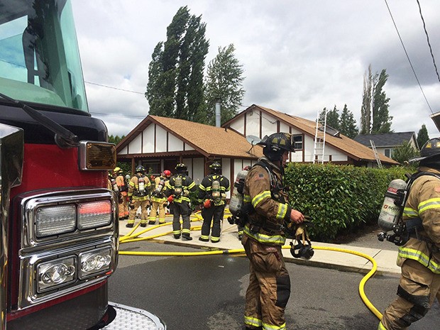 Firefighters quickly doused a house fire that displaced a family of six late Thursday morning.