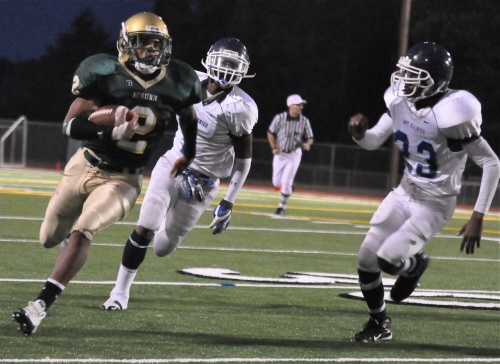Alphonse Wade romps for his second rushing touchdown against Mount Rainier at Auburn Memorial Stadium on Friday.