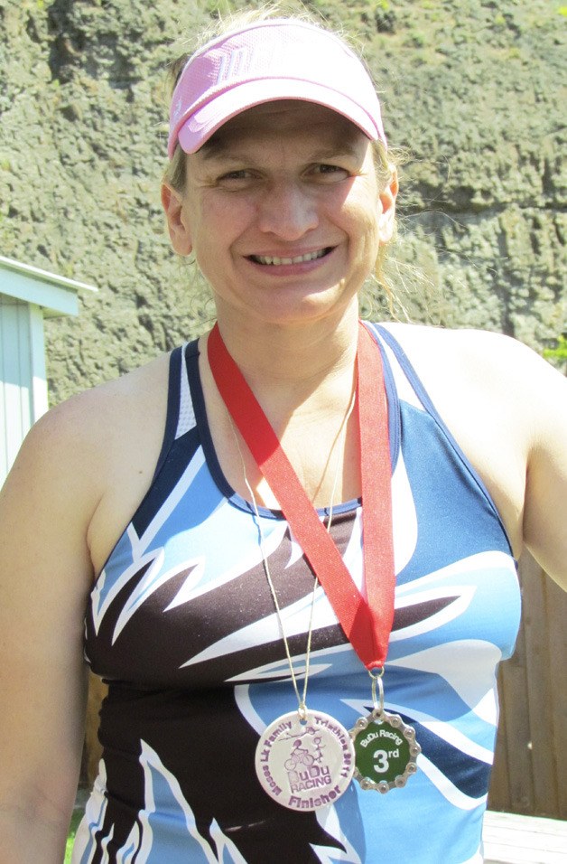 Strong and resilient: Auburn’s Donna Johnson has become a consistent top-third finisher in local and regional triathlon fields. ‘I enjoy it. It’s all about people